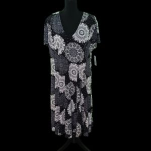 Black slinky dress with white pattern. NWT